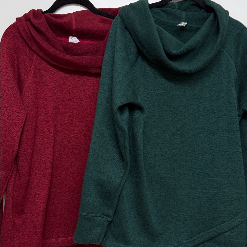 Two Ideology fleece sweatshirts one Red and one Green